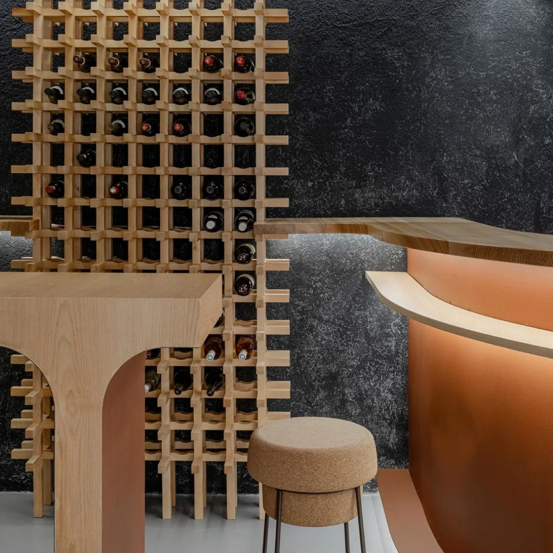 Wine Diplomacy bar interior with wine bottles and seating